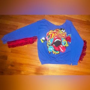 Blue custom made graphic sweatshirt. Red fringe down arm